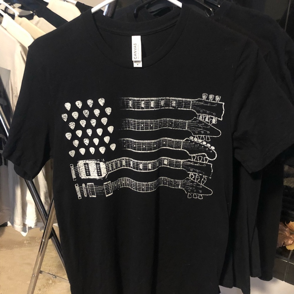 Mens black T-shirt. Guitar design